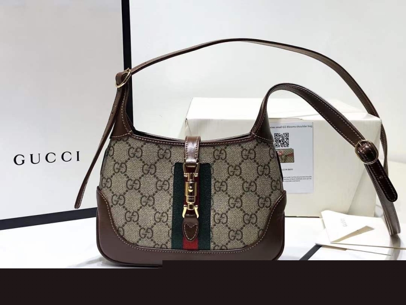 G*u*i top handle bags